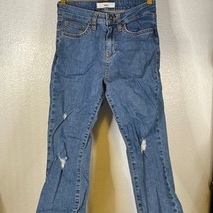 Vans medium washed skinny jeans.